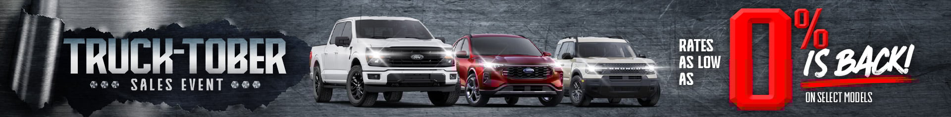 Promotional graphic with three Ford vehicles (a white truck, a red SUV, and a grey SUV) in front of a dark steel background. Bold text reads “Truck-tober Sales Event. Rates as low as 0% is back! On select models.” Logo for Mid-Town Ford Winnipeg is at the top.